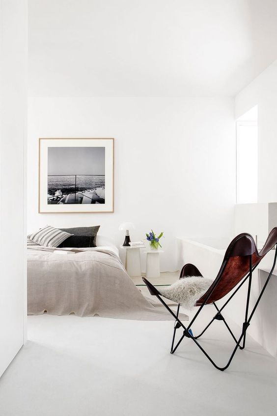 clean-modern-bedroom-with-designer-chair