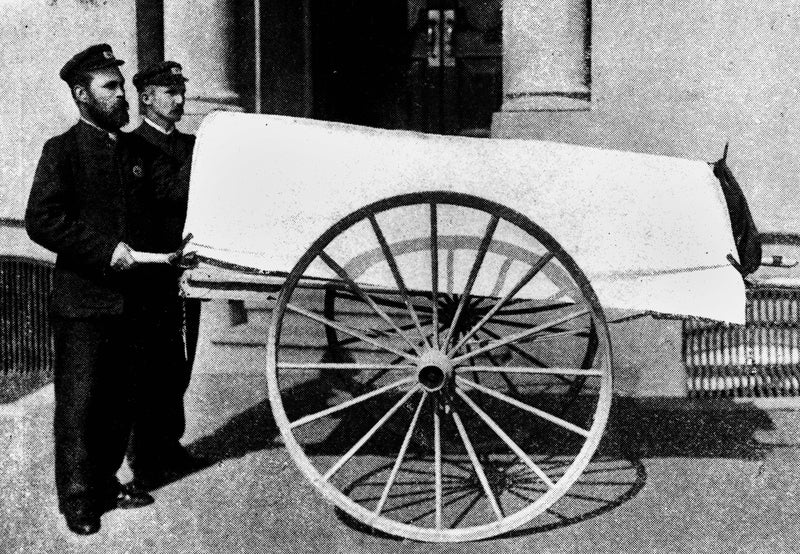 1901 Brisbane ambulance staff with a wheeled litter