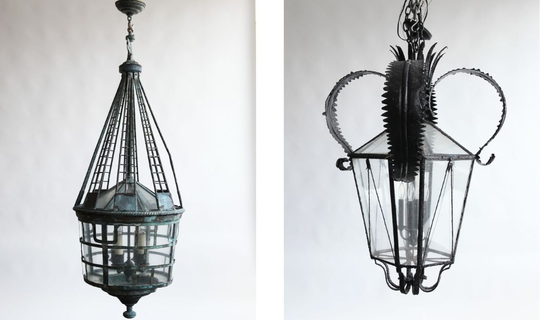 Two original vintage fixtures, one black and one verdigris, hanging in their original, pre-restored state.