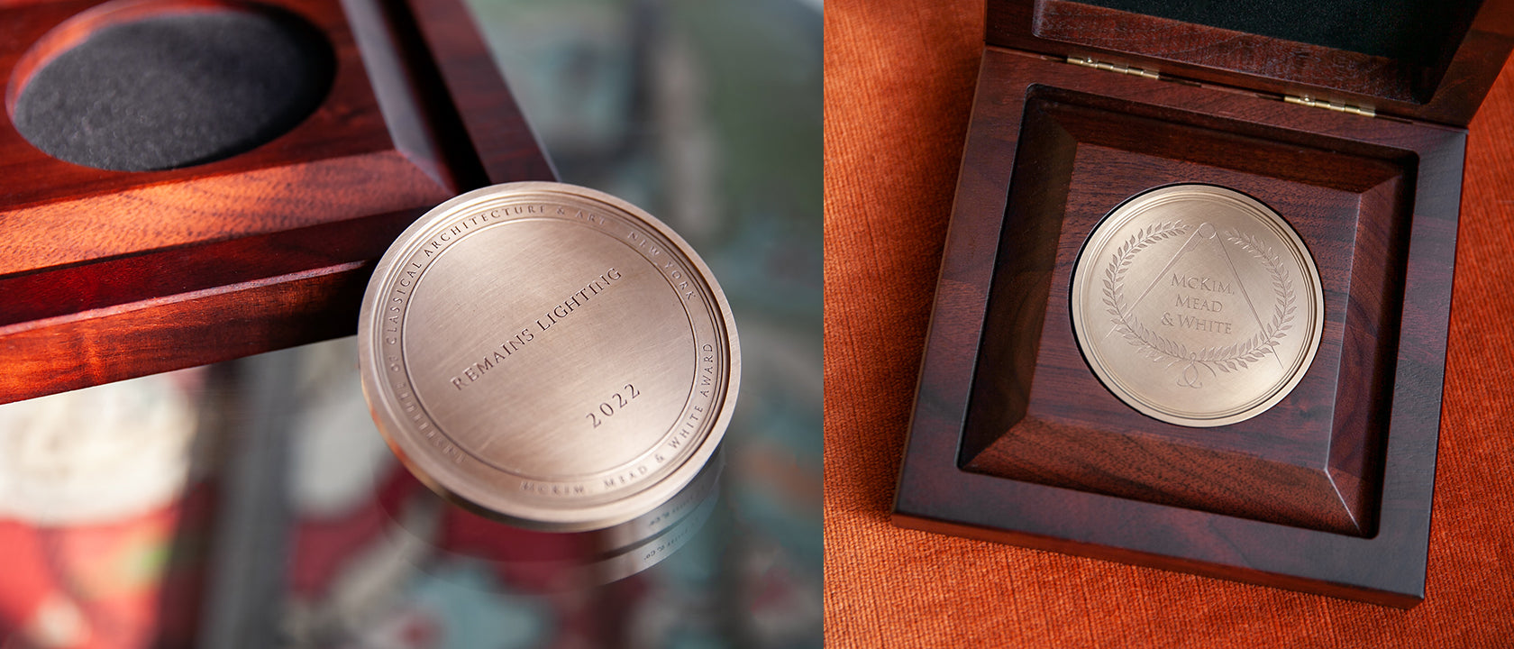 The McKim, Mead and White Award - a circular patinated bronze disk inscribed with the words Remains Lighting, shown in its case and next to it.