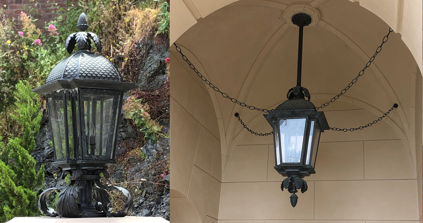 A cast bronze pier light installed in front of a rock wall garden, and the ceiling lantern installed in a limestone vaulted entryway.