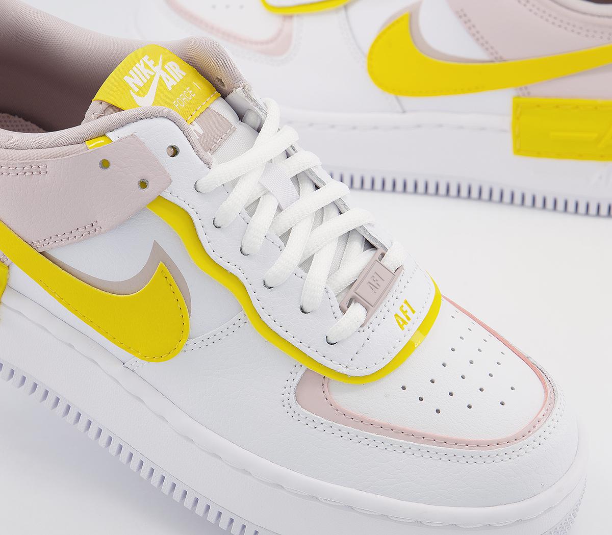 white nike air force 1 with yellow tick