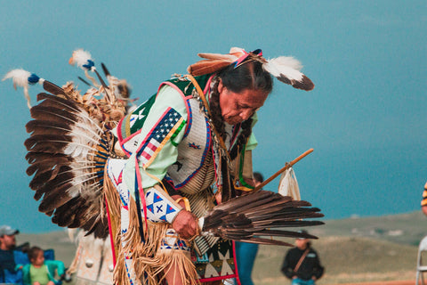 native-american-use-rubbber-stamp-to-mark-their-body-for-tatooing