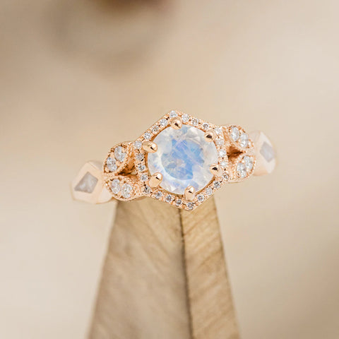 14K rose gold "Lucy In The Sky" Petite engagement ring with a round rainbow moonstone center, diamond halo & accents, & diamond dust inlays
