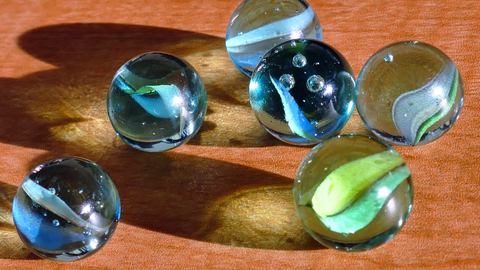 Glass Bubble Inclusions in Marbles