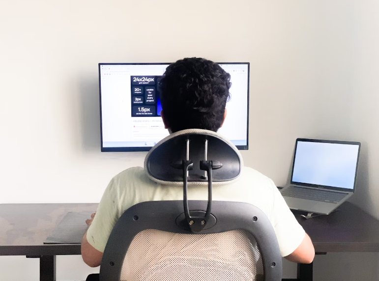 man on a chair with a headrest