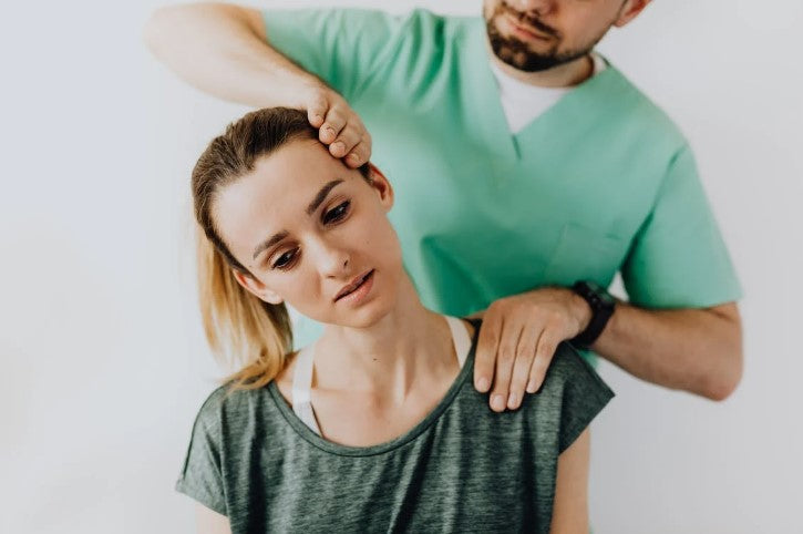 woman being treated for back pain