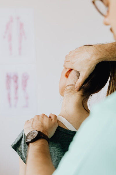 woman getting neck treatment