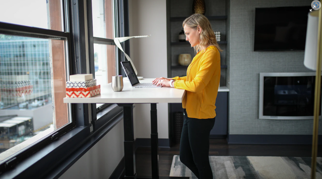 woman standing while working