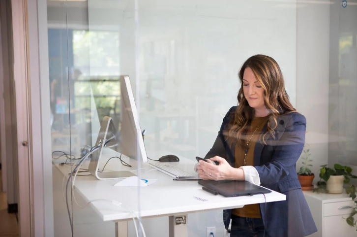 woman using a standing desk