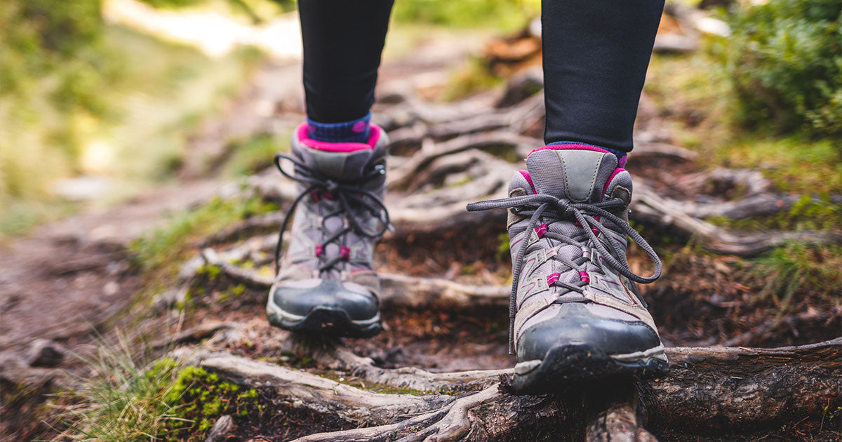 Woman in hiking boots on hike