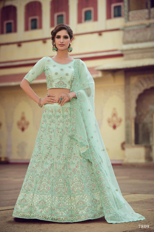 Peach lucknowi georgette lehenga by Zari Jaipur