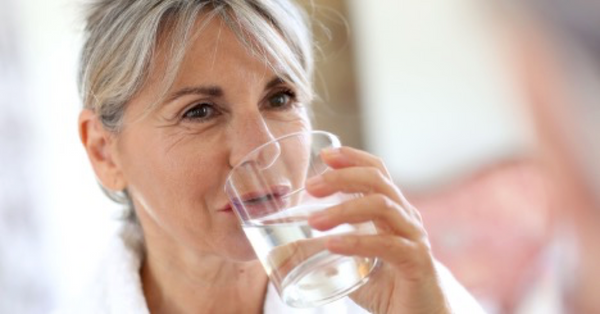 Woman drinking water - Divas Never Age® Blog