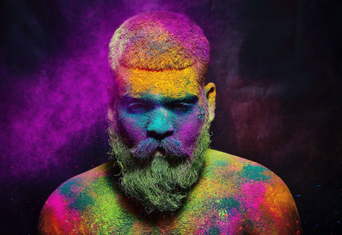Man with color in his beard and hair