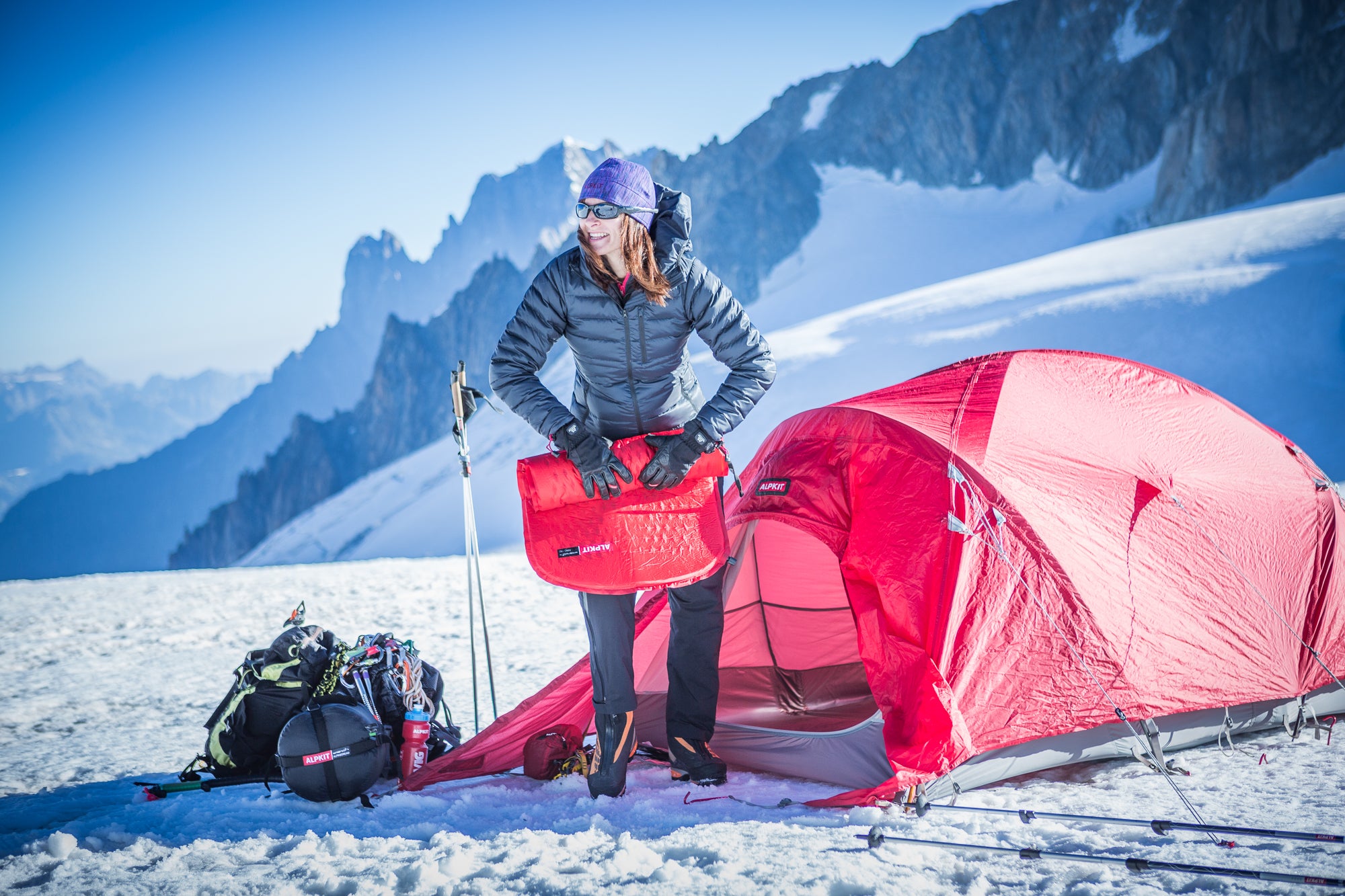 Two people camping in the Alps with a 4-season mountain tent