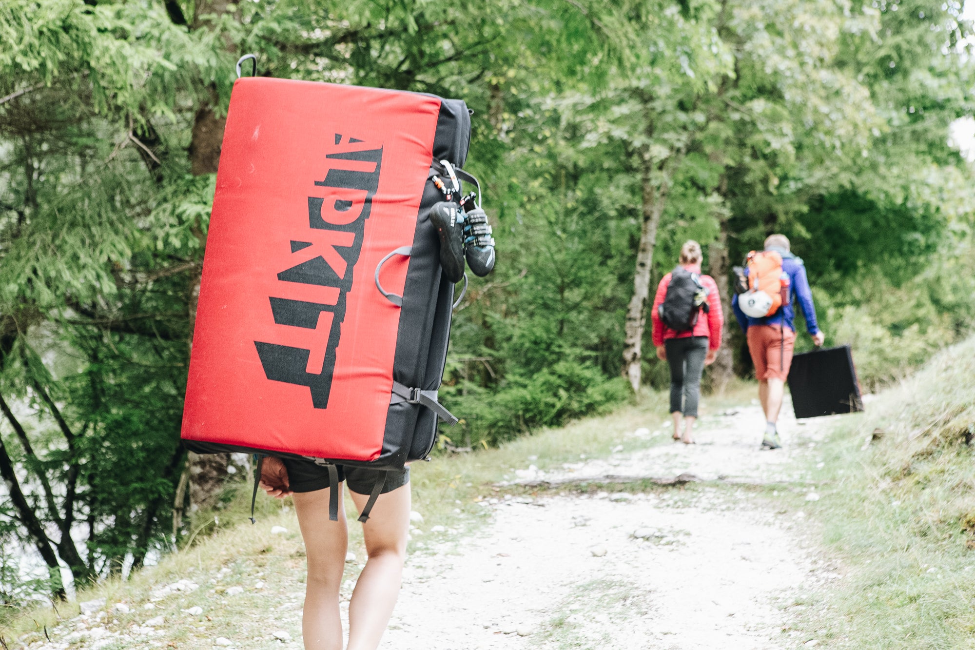 Carrying a bouldering mat into a project in Slovenia