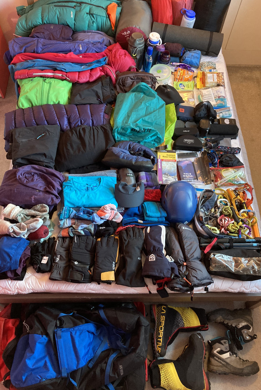 Outdoor kit donations including down jackets and climbing kit