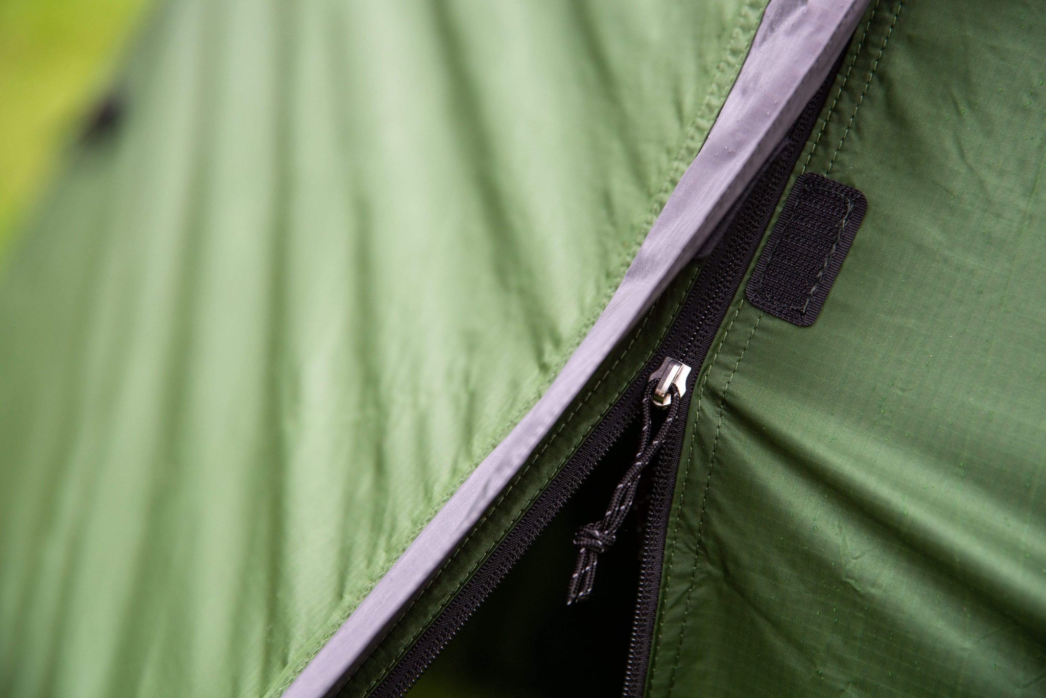 Close-up of a tent zip on the outer tent