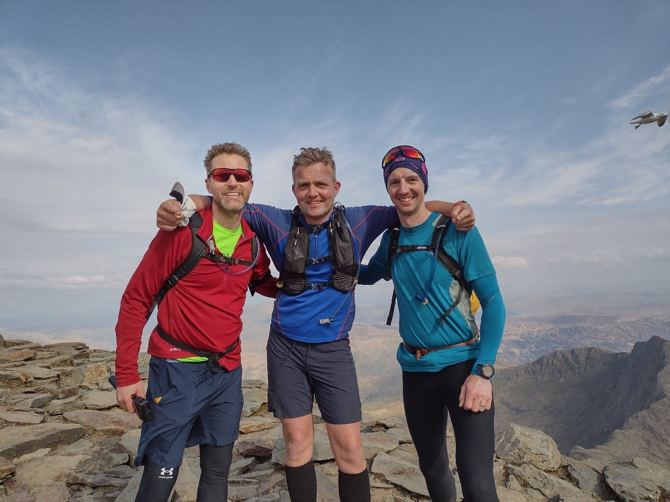 Trail runners on top of mountain