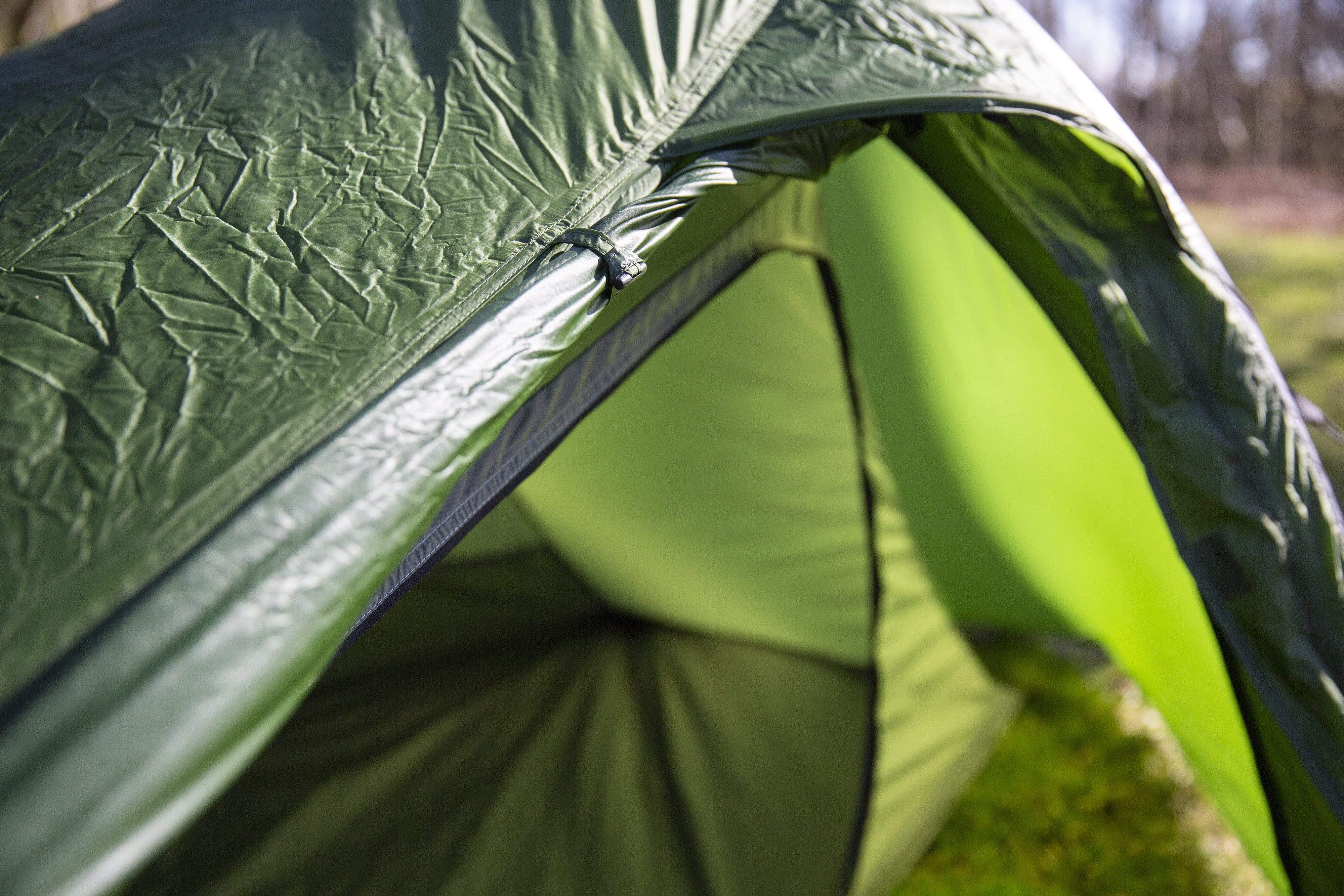 Storm flap protects tent vestibule