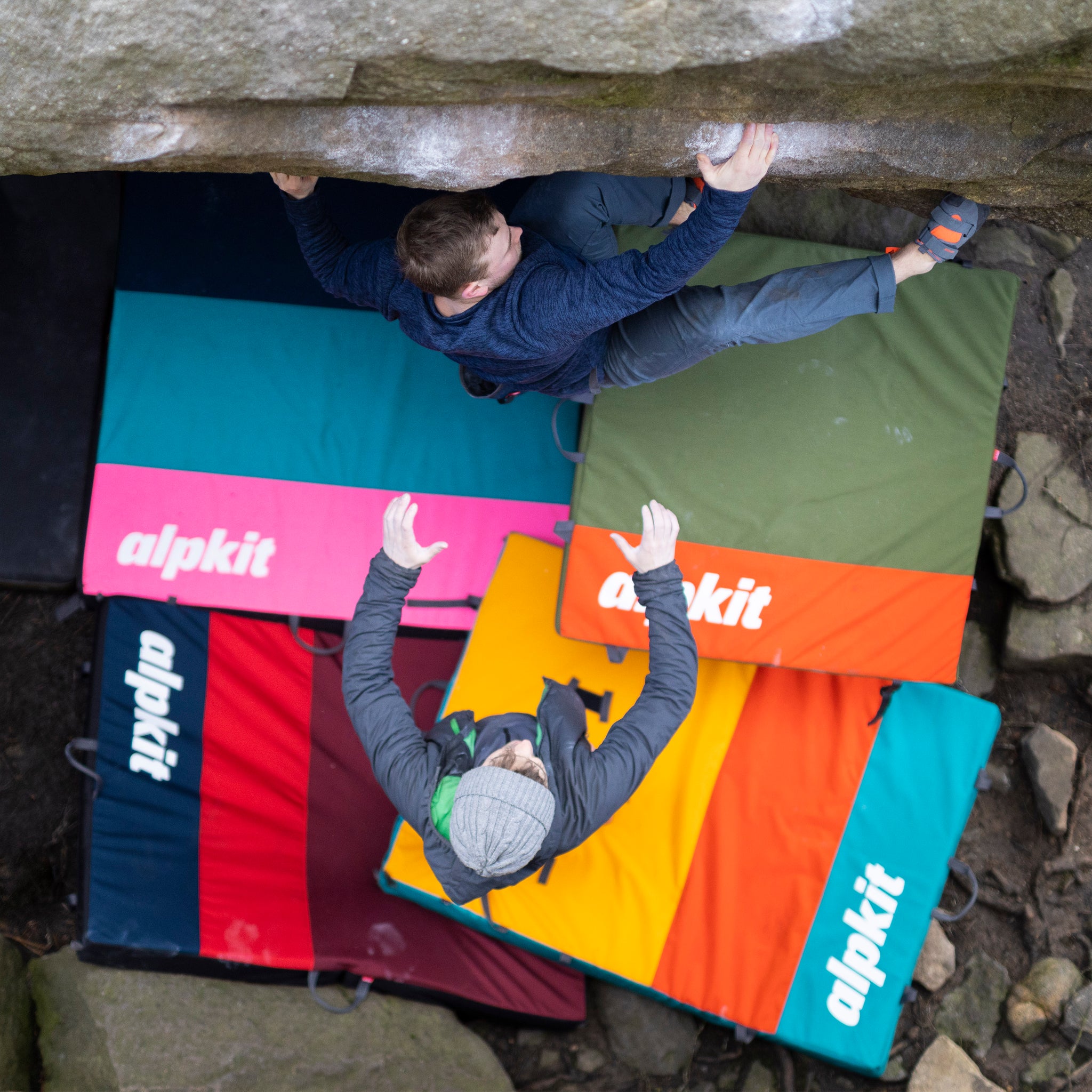 Bouldering in the Peak District with brightly coloured Alpkit bouldering mats