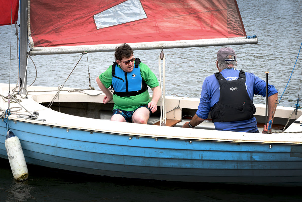 man with cerebral palsy sailing