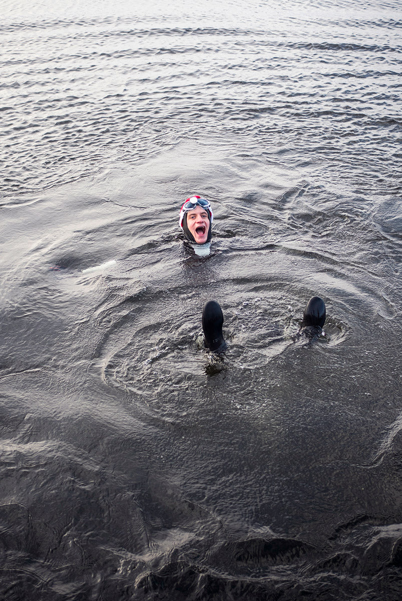 Wild swimming in a winter loch