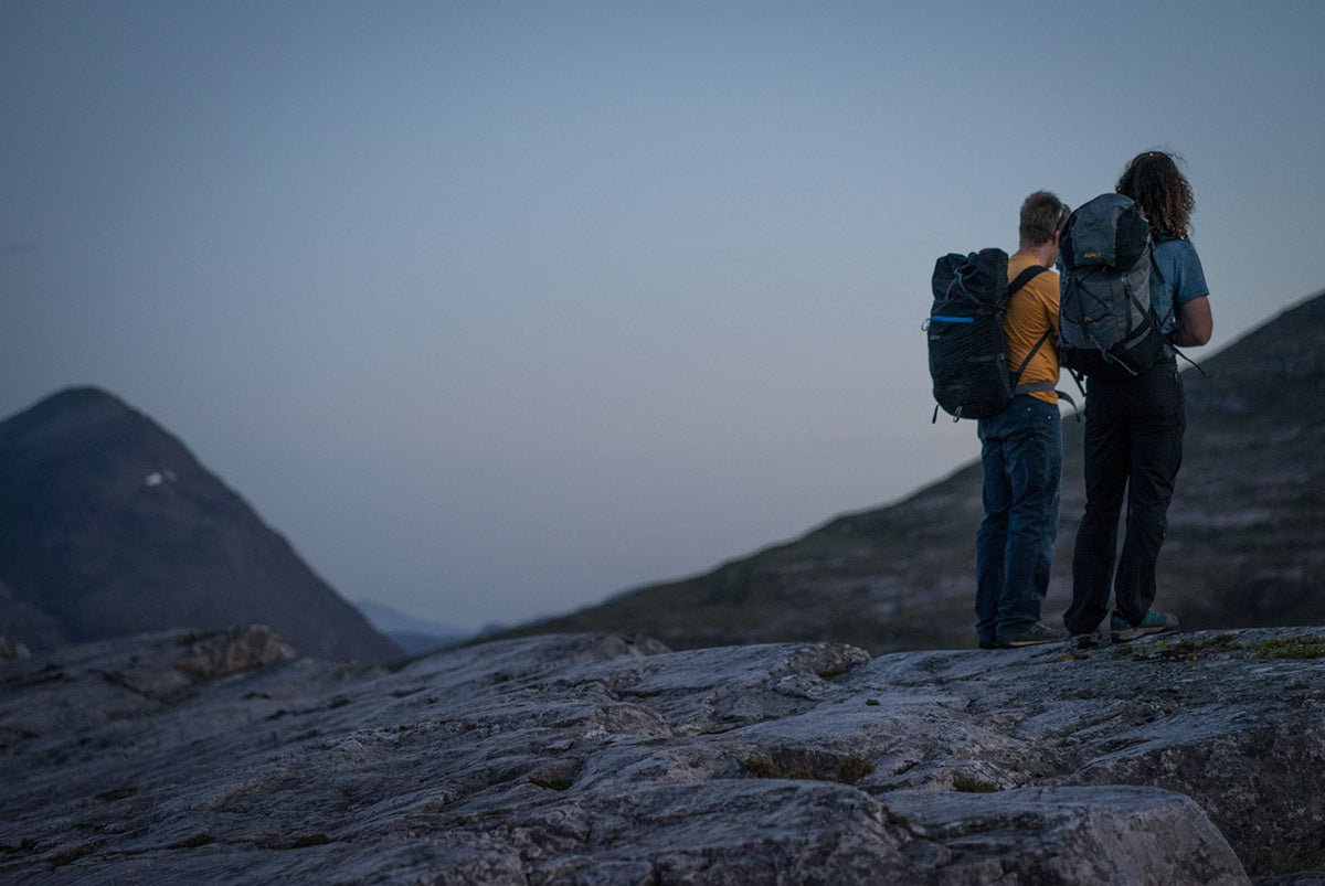 Hikers navigating in the mountains