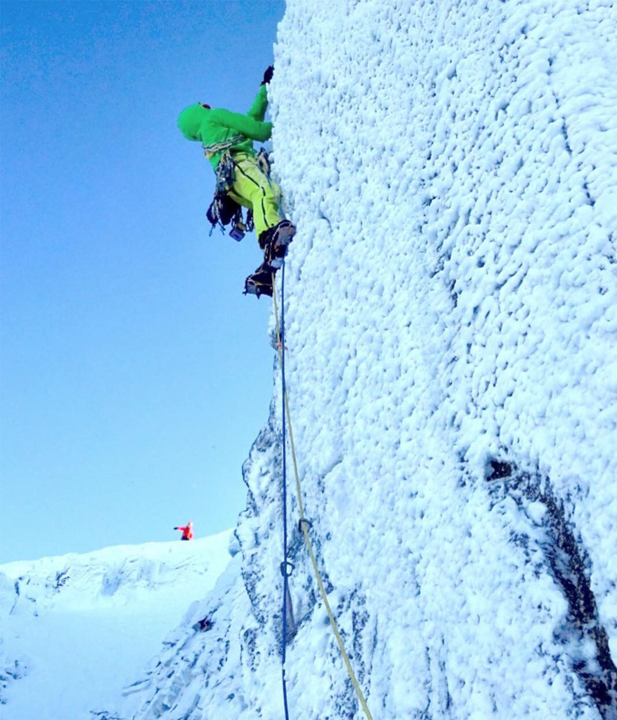 Climber exposed on icy Scottish mixed climb