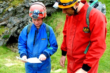 Cavers getting ready to descend