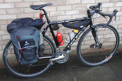 Cycle touring bike loaded with panniers