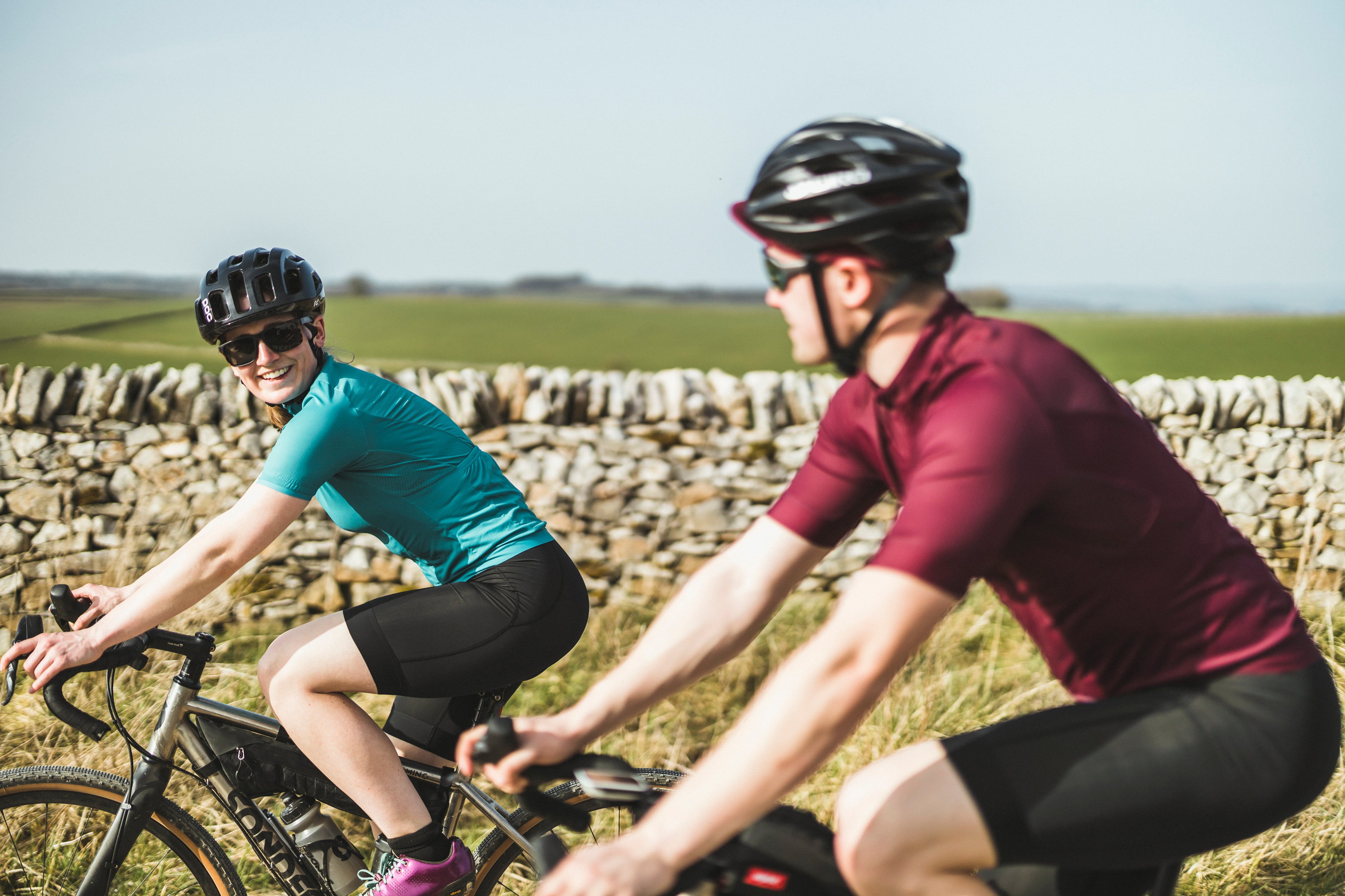 couple riding gravel bikes