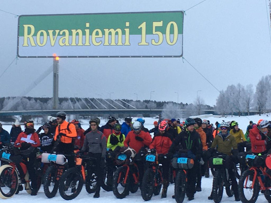 Racers at the start line in the Rovaniemi 150 bikepacking race