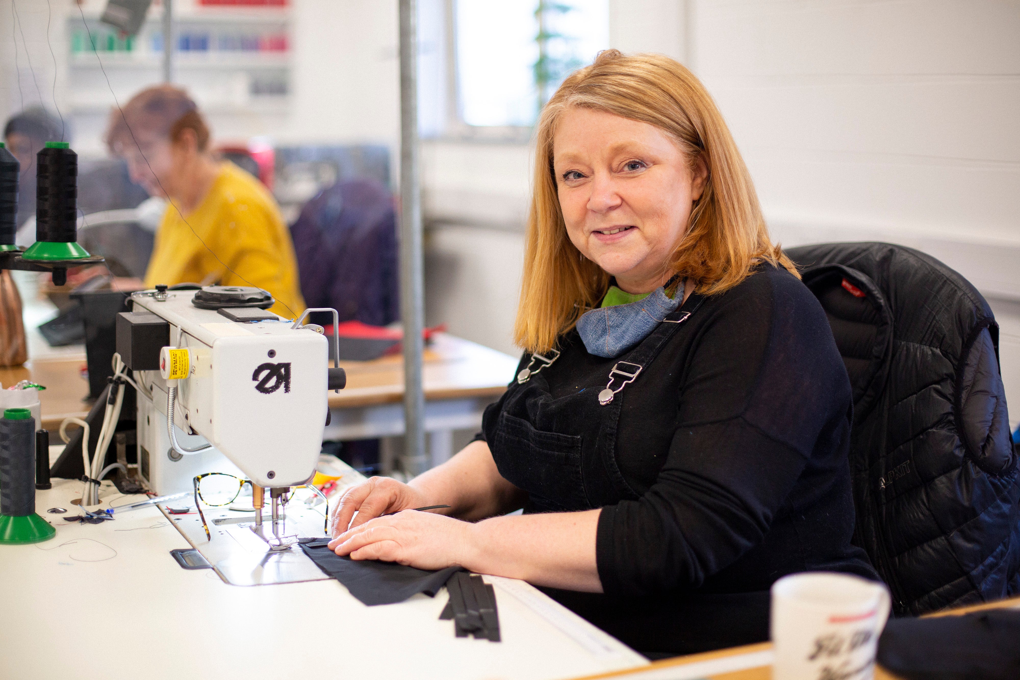 Machinists making bike luggage in Britain