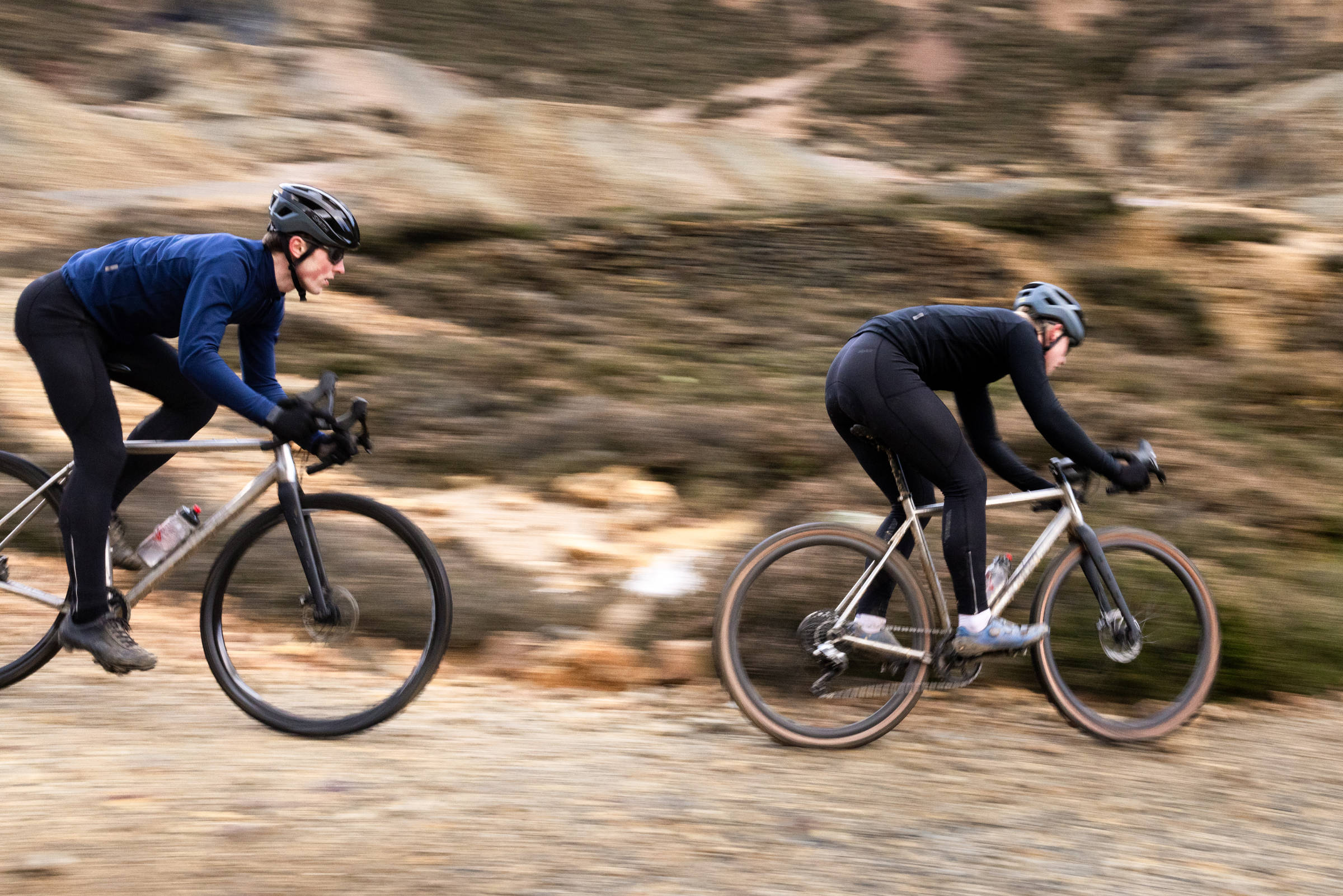 Gravel race bikes on fast gravel descent