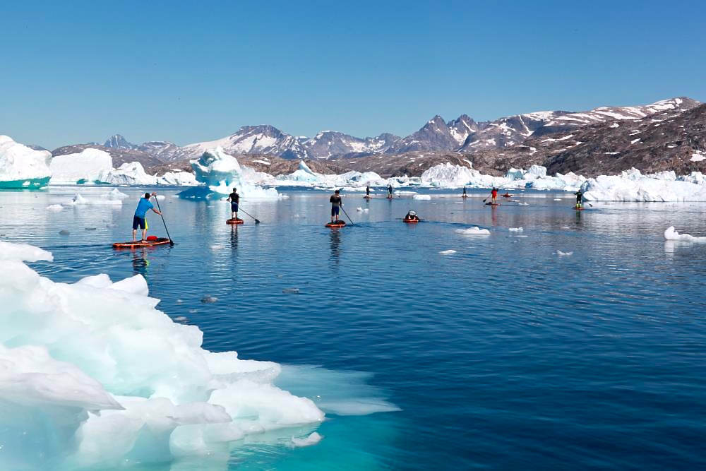 Stand-up paddleboarding expedition in the artic circle