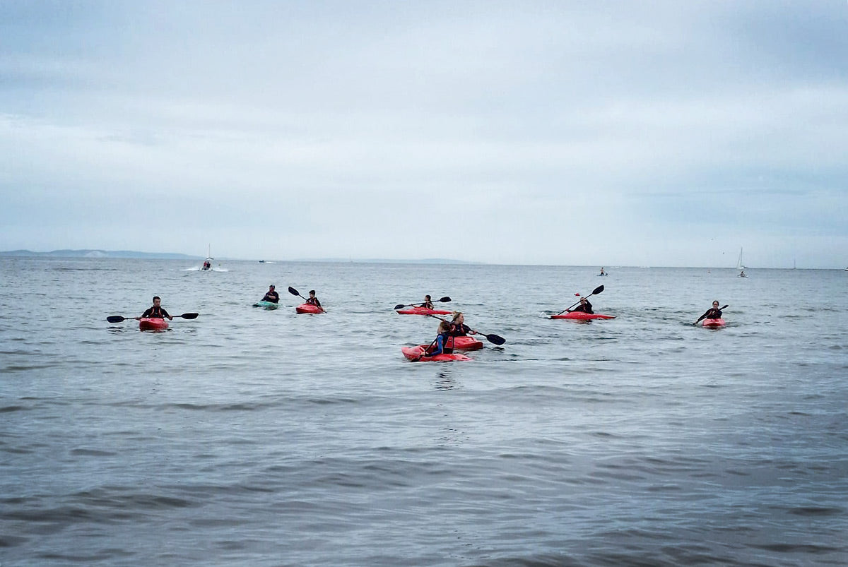 Sea Cadets kayaking on the sea