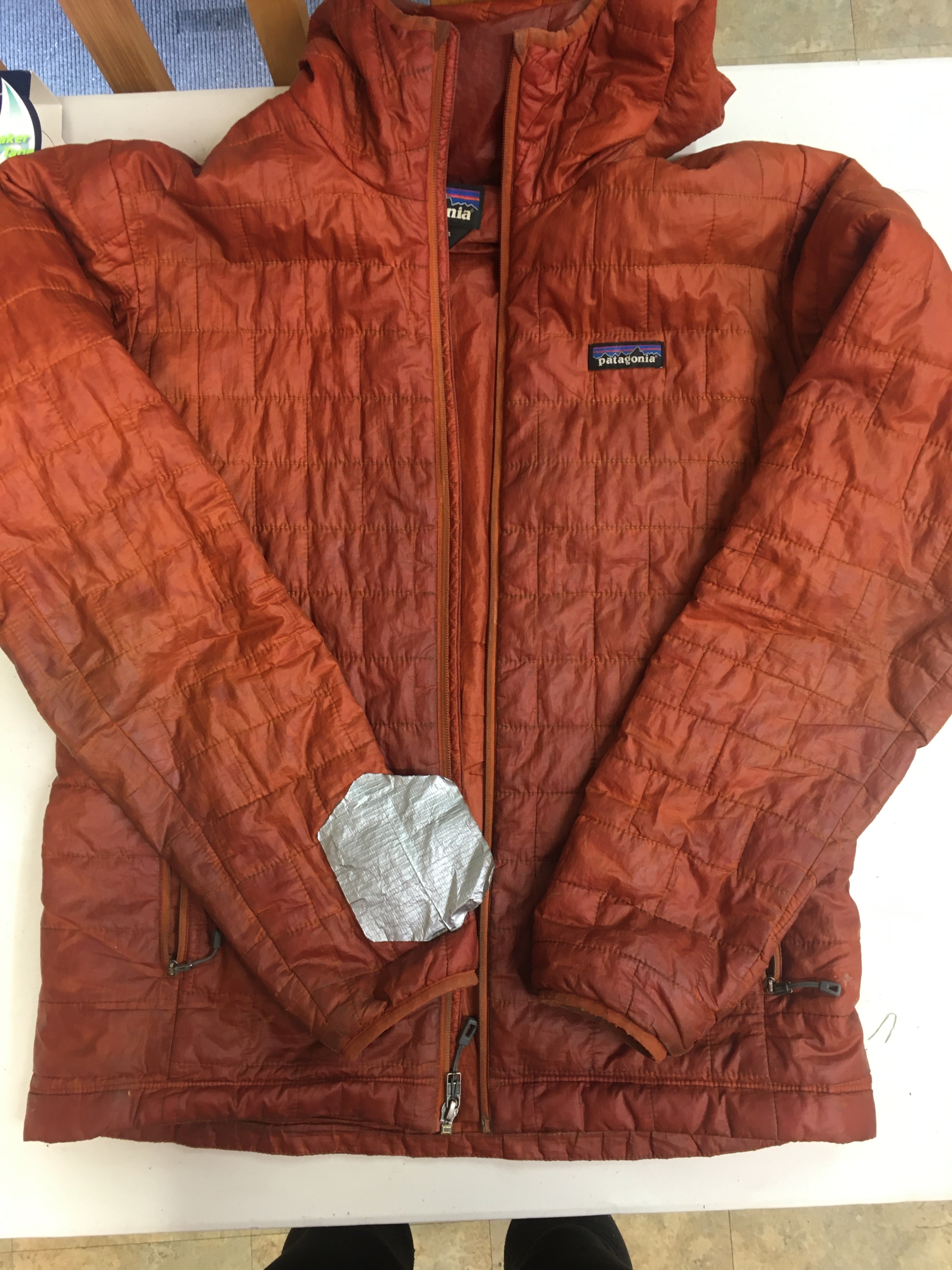 patched up Patagonia jacket