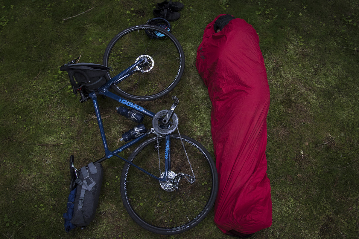 A hooped bivvy is a lightweight and space saving option for solo cyclists