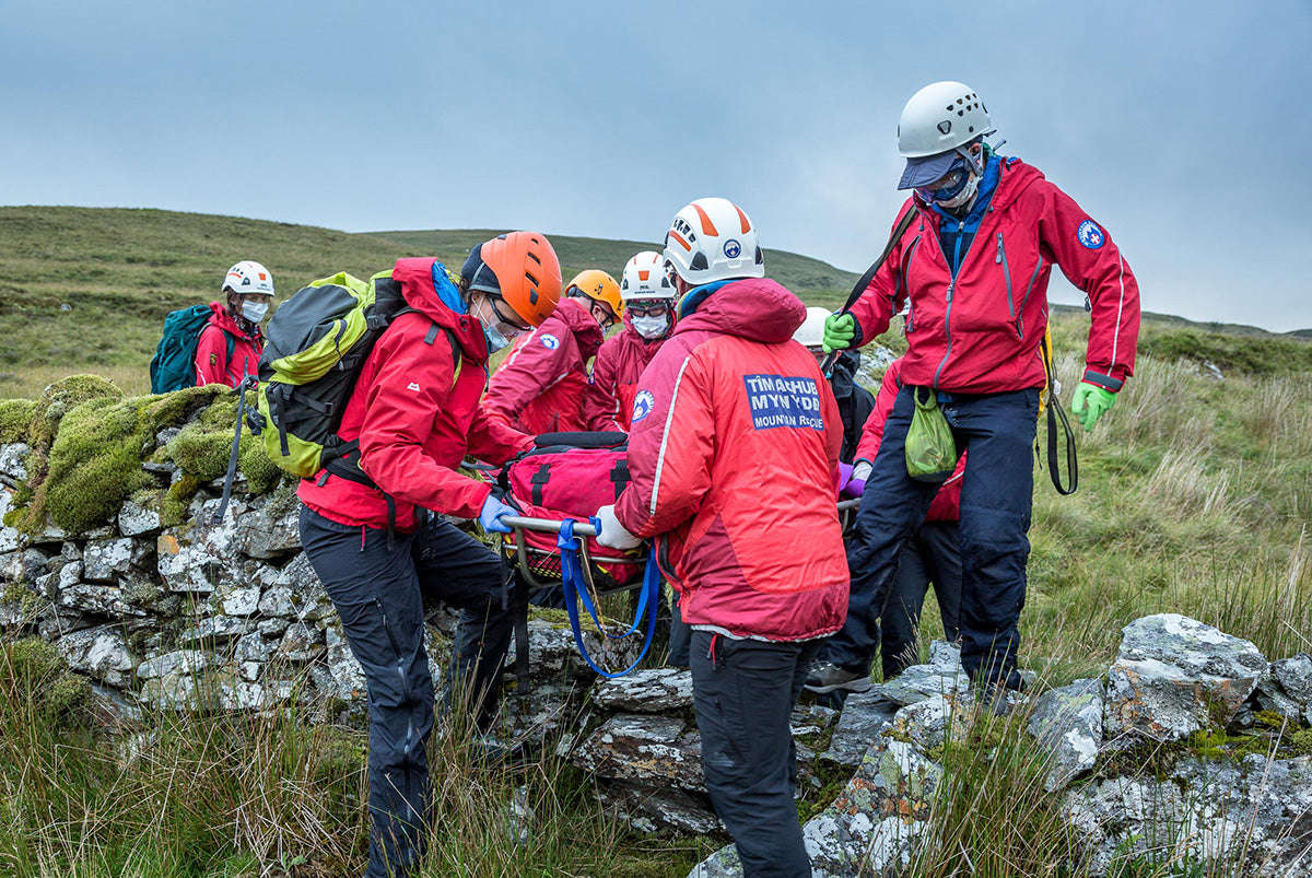 Peak District Mountain rescue team carrying a stretcher