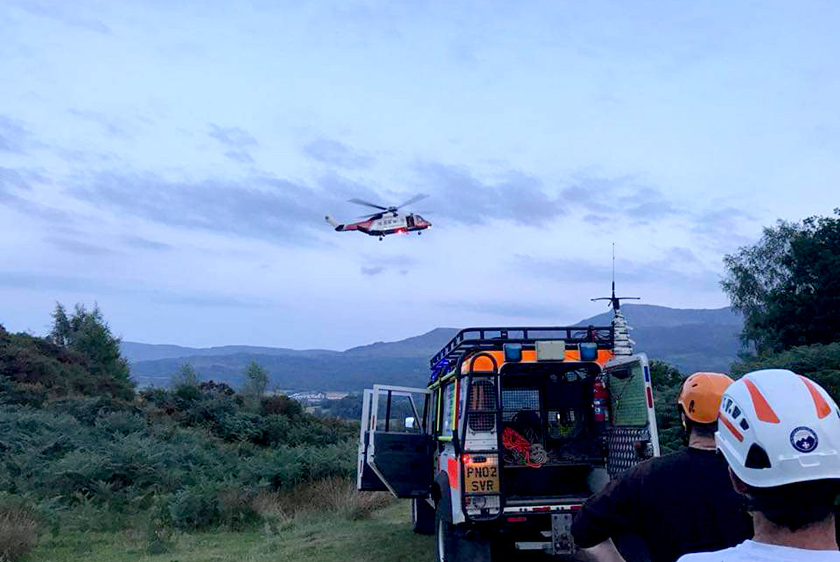 Helicopter landing with Peak District Mountain rescue team