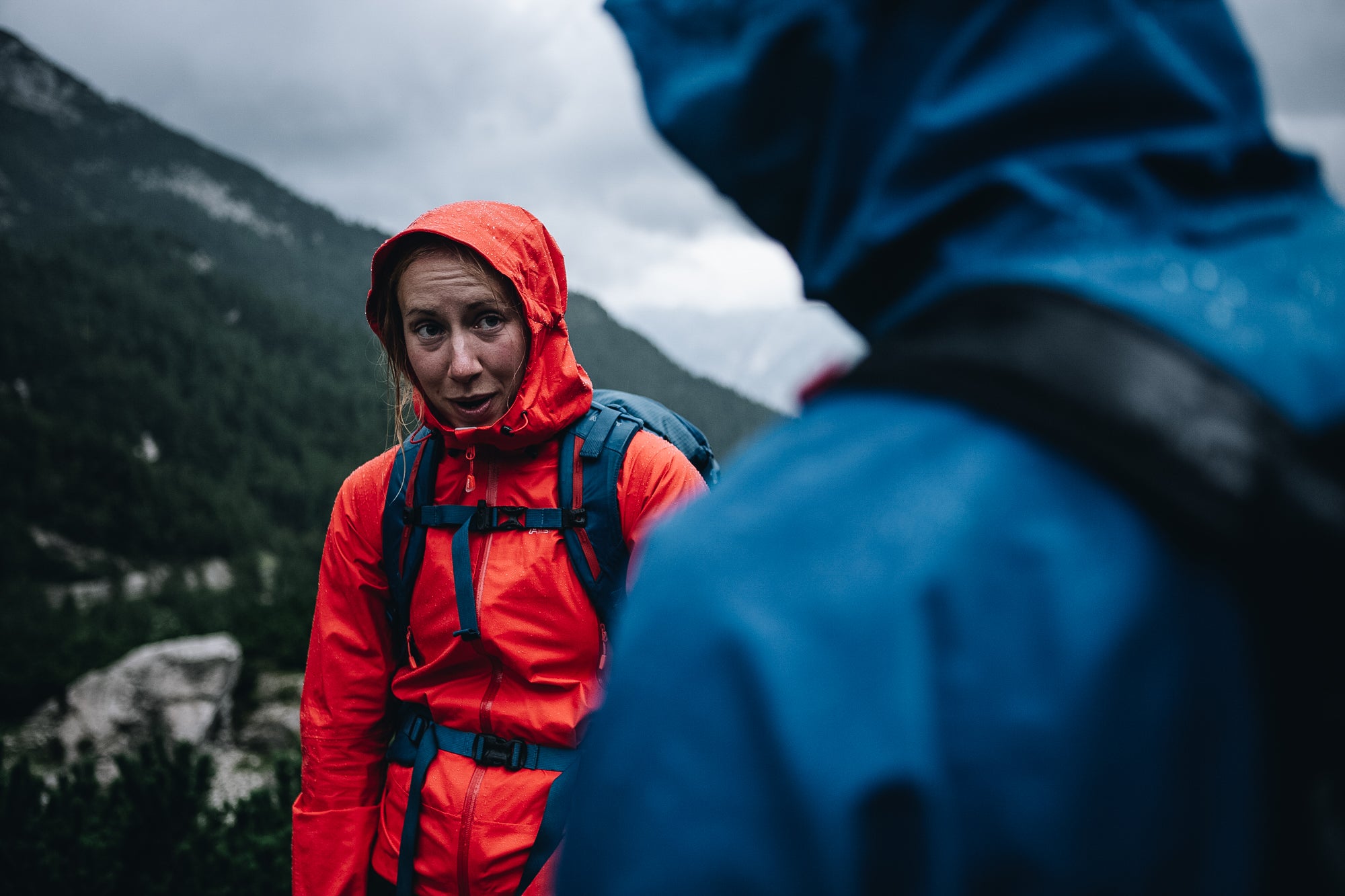 Hikers staying dry in waterproof and breathable Alpkit coats