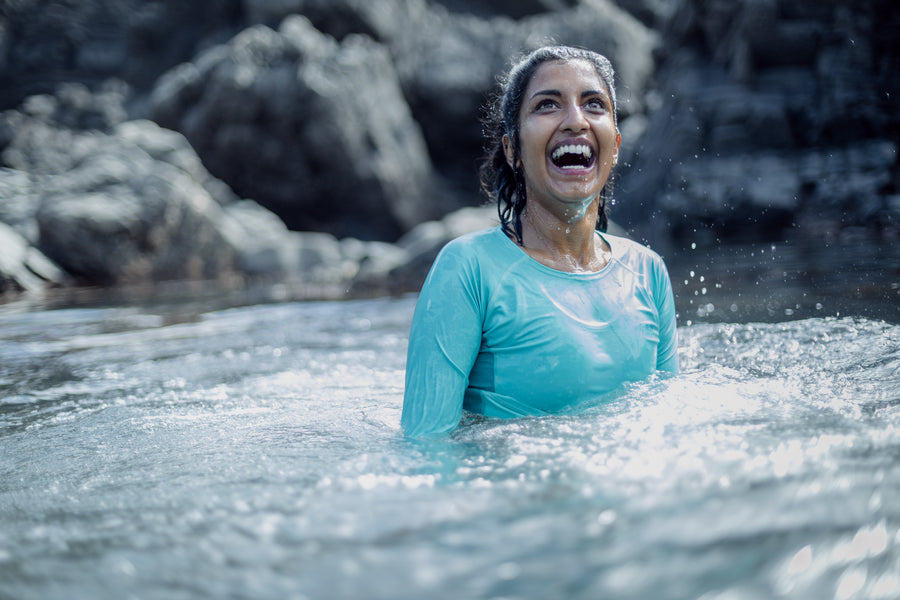 woman smiling and wild swimming