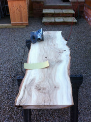 Sanding a live edge Oak slab