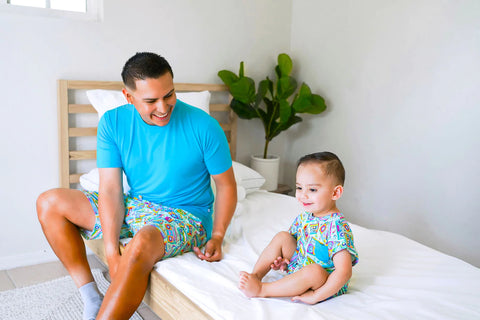 Father and son wearing matching radio pajamas