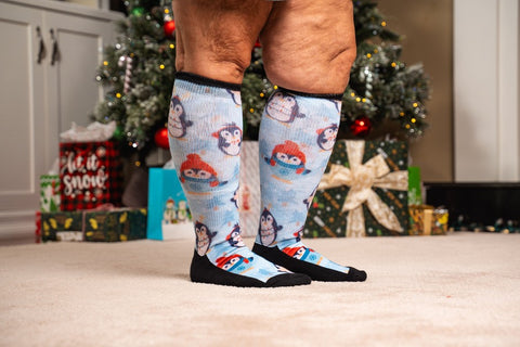 A person wearing Christmas diabetic socks