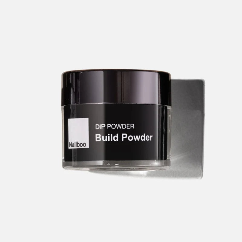 A jar of Nailboo Dip Powder Build Powder against a white background.
