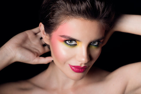 Bright, vibrant colors on a models face 