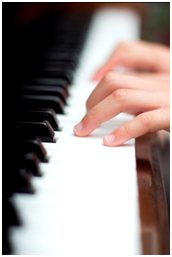 Student playing piano