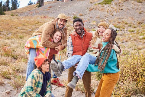 group of friends wearing lots of cozy layers